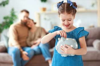 young girl saving with family